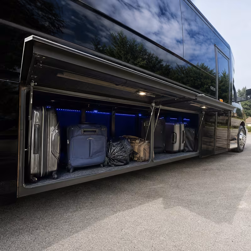 Party bus interior with wraparound leather seating and LED lighting in Orlando