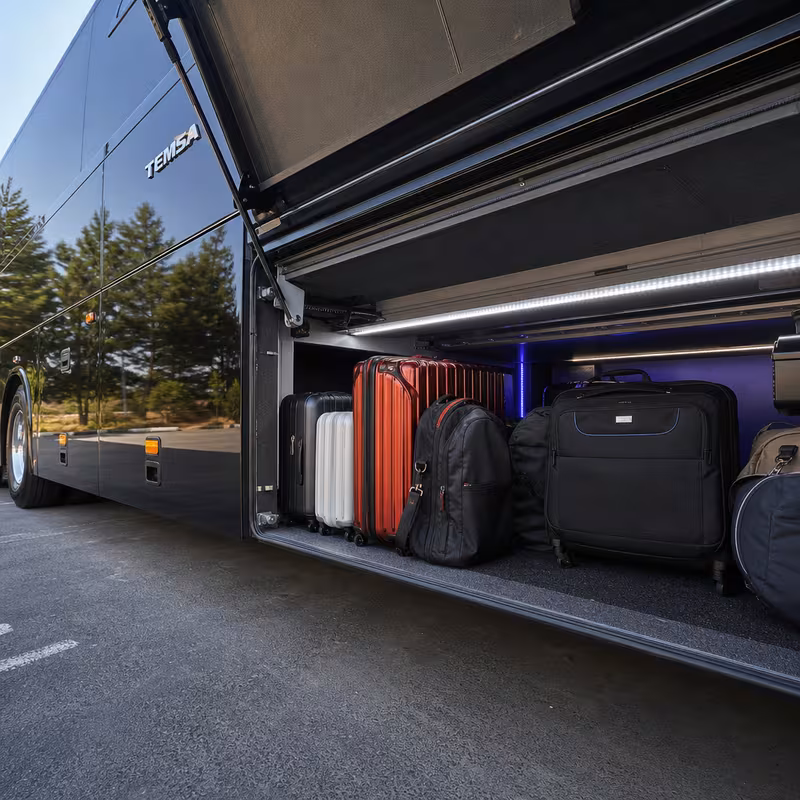 Party bus interior with wraparound leather seating and LED lighting in Orlando